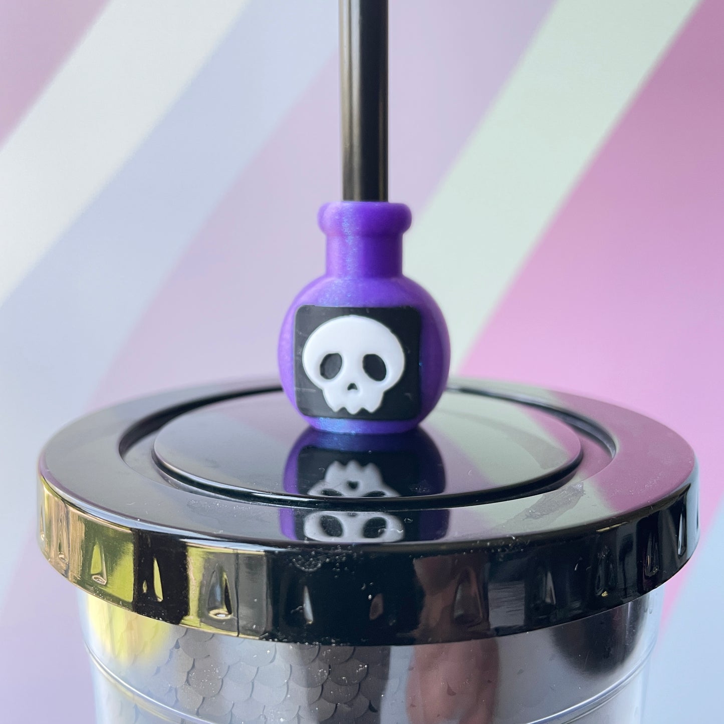 Magic Potion Straw Topper with Sparkly Purple Bottle and Skull Design