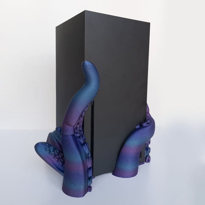 3D printed tentacle-style dock for vertical gaming console on white background.
