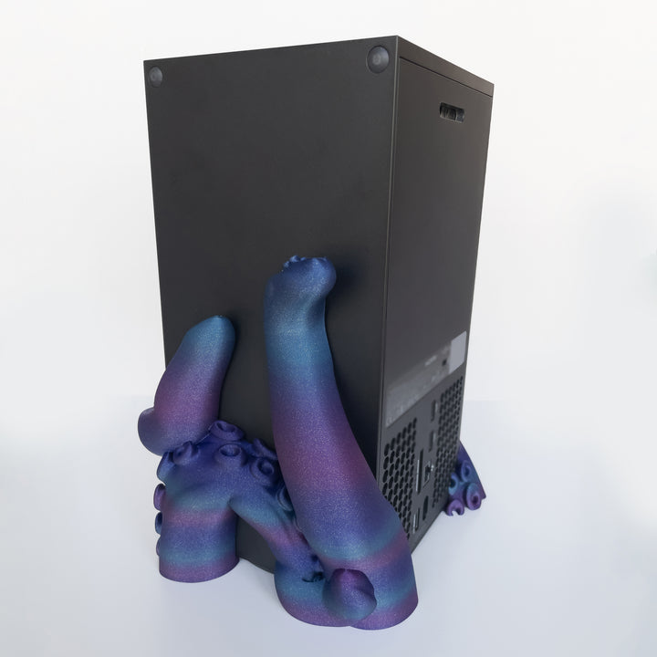 Tentacle-inspired 3D printed stand with ocean aesthetic.