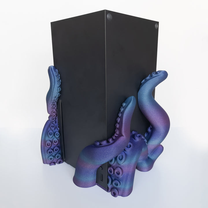 3D printed tentacle-style dock for vertical gaming console on white background.